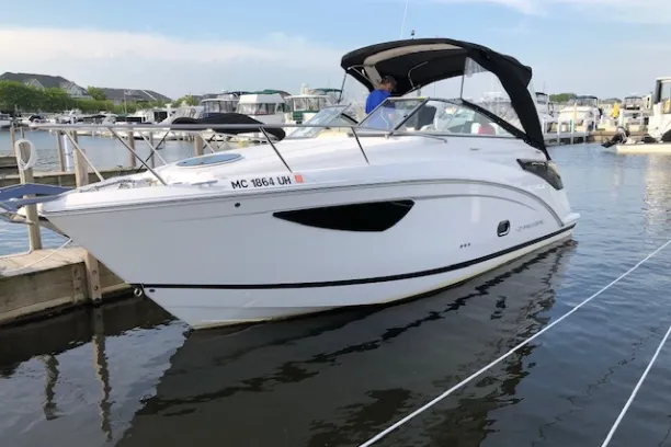 a boat is docked next to a body of water