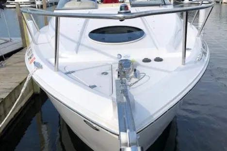 a boat parked next to a body of water