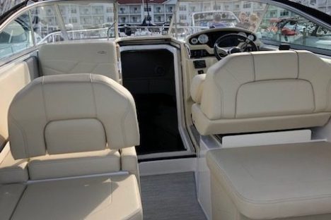 a boat sitting on top of a car